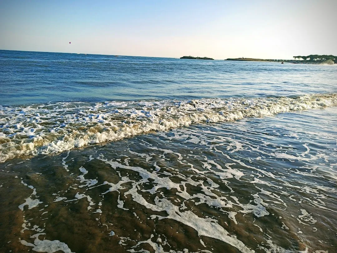 Indian people relaxing at Nagoa beach. Diu. Union territory of Daman and Diu.  India Stock Photo - Alamy