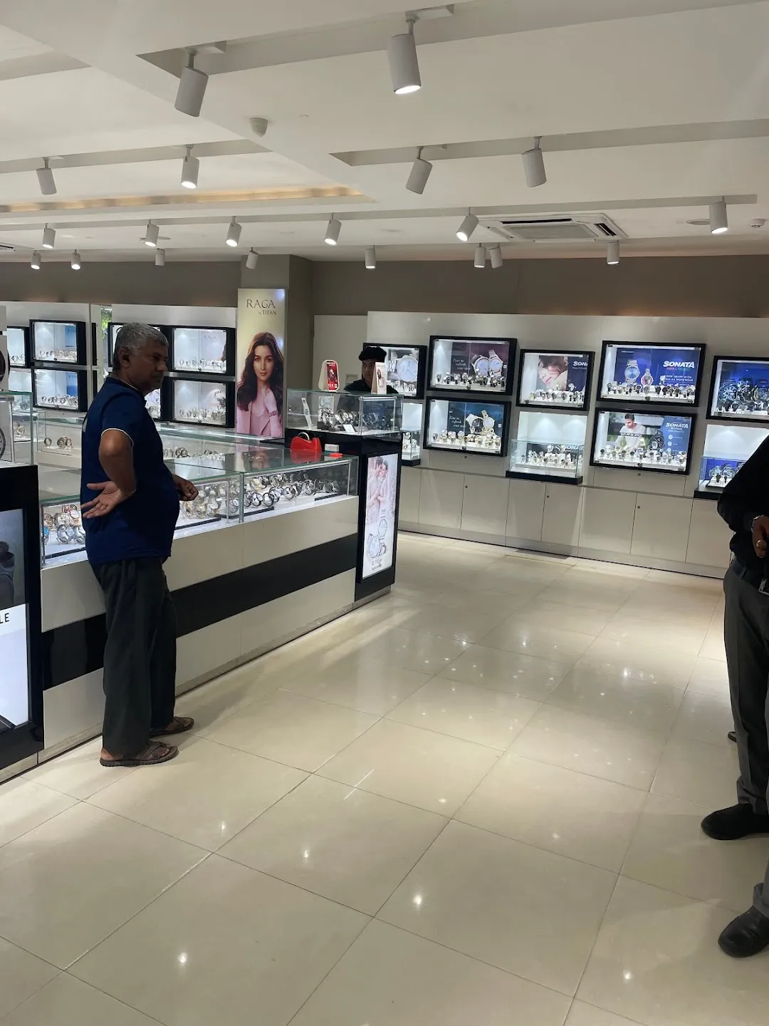 Titan watch sale showroom in maninagar