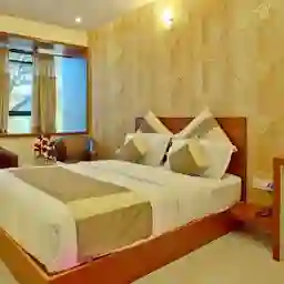 Aishwarya Suites ( Best Premium Hotel in Mysore )