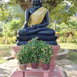 Buddhist Prayer Flag and Statues