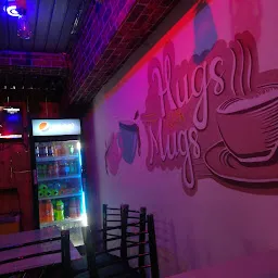 # Hugs With Mugs Cafe