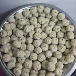 JAI GURU MOMOS