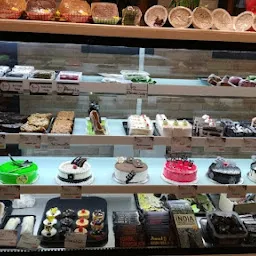 Just cake's cafe & Bakery shop best cake shop in agra home delivery available 100%Eggless