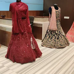 Nirmal Creations - bridal lehengas, bridesmaid lehengas, designer sarees, gowns, suits and tunics store in kolkata