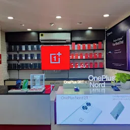 One plus mini store karamana