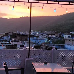 Shivam restaurant ,lake ,fort and sunset view