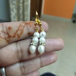 SRI KAPI PEARLS & GEMS