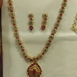 Sri tharun gold covering
