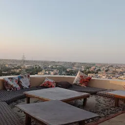 Sun set palce roof top restaurant on fort